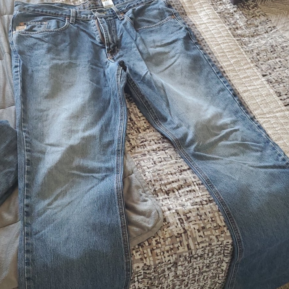 Cinch tan label Jean's 35x38